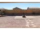 Patio with fire pit and stepping stones in gravel backyard at 21963 W Gardenia Dr, Buckeye, AZ 85326