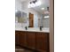 Double vanity bathroom with modern fixtures at 21963 W Gardenia Dr, Buckeye, AZ 85326
