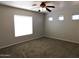 Bright bedroom with carpet and ceiling fan at 21963 W Gardenia Dr, Buckeye, AZ 85326