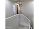Loft hallway with doors to bedrooms and bath at 21963 W Gardenia Dr, Buckeye, AZ 85326
