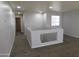 Spacious loft area with carpet and window at 21963 W Gardenia Dr, Buckeye, AZ 85326