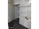 Functional pantry with built-in shelves offering ample storage space at 21963 W Gardenia Dr, Buckeye, AZ 85326