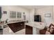 Modern kitchen with granite countertops and stainless steel appliances at 24413 W Raymond St, Buckeye, AZ 85326