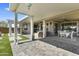 Inviting backyard patio with a comfortable seating area and serene outdoor views at 27395 W Wahalla Ln, Buckeye, AZ 85396