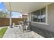 Charming outdoor seating area with a dining table, perfect for enjoying meals al fresco at 27395 W Wahalla Ln, Buckeye, AZ 85396