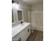 Modern bathroom with white vanity, quartz countertop, and shower/tub combo at 28756 N Desert Hills Dr, San Tan Valley, AZ 85143