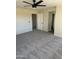 Spacious bedroom with ceiling fan and ample closet space at 28756 N Desert Hills Dr, San Tan Valley, AZ 85143