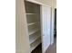 Well-lit pantry with ample shelving for storage at 28756 N Desert Hills Dr, San Tan Valley, AZ 85143