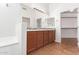 Double vanity bathroom with tile flooring and walk-in shower at 2989 N 44Th St # 1004, Phoenix, AZ 85018