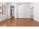 Spacious bedroom with hardwood floors and ensuite bathroom access at 2989 N 44Th St # 1004, Phoenix, AZ 85018