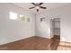 Bedroom with ceiling fan, hardwood floors and private closet at 2989 N 44Th St # 1004, Phoenix, AZ 85018