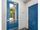 Apartment entry doors with modern blue paint and glass at 2989 N 44Th St # 1004, Phoenix, AZ 85018
