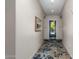 Building hallway with carpeted floor and modern wall decor at 2989 N 44Th St # 1004, Phoenix, AZ 85018