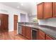 Modern kitchen with stainless steel appliances and granite countertops at 2989 N 44Th St # 1004, Phoenix, AZ 85018