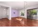Living room with hardwood floors and access to a patio at 2989 N 44Th St # 1004, Phoenix, AZ 85018