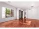 Living room with hardwood floors and large windows at 2989 N 44Th St # 1004, Phoenix, AZ 85018