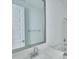 Modern bathroom with white countertops and neutral tile floor at 32034 N 125Th Ave, Peoria, AZ 85383
