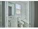 Clean bathroom with tub, shower, and modern vanity at 32034 N 125Th Ave, Peoria, AZ 85383