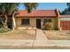 Cute updated condo with a charming front yard and walkway at 3331 W Del Monico Ln, Phoenix, AZ 85051