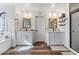 Large bathroom with double vanity and walk-in shower at 38100 W Santa Clara Ave, Maricopa, AZ 85138