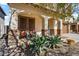 Inviting front porch with seating and landscaping at 38100 W Santa Clara Ave, Maricopa, AZ 85138