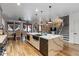 Open concept kitchen with large island and farmhouse style details at 38100 W Santa Clara Ave, Maricopa, AZ 85138