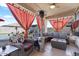 Relaxing covered patio with comfortable seating and a heater at 38100 W Santa Clara Ave, Maricopa, AZ 85138
