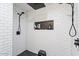 Modern shower with subway tile and niche at 38100 W Santa Clara Ave, Maricopa, AZ 85138