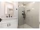 Beautiful bathroom featuring a modern vanity, sleek faucet, and a glass-enclosed walk-in shower at 412 W Vermont W Ave, Phoenix, AZ 85013
