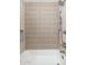 Beautifully tiled shower with both fixed and handheld shower heads at 412 W Vermont W Ave, Phoenix, AZ 85013