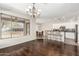 Dining Room with hardwood floors, lots of natural light, and view to kitchen at 41216 N Shadow Creek Ct, Anthem, AZ 85086