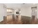 Hardwood floor living room with fireplace and lots of open area at 41216 N Shadow Creek Ct, Anthem, AZ 85086
