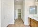 Clean bathroom with walk-in shower and tiled floor at 42950 W Misty Morning Ln, Maricopa, AZ 85138