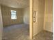 Bedroom view with unfinished walls and window at 4509 S 95Th Dr, Tolleson, AZ 85353