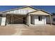 New construction with scaffolding and protective wrap, awaiting exterior finishing at 4509 S 95Th Dr, Tolleson, AZ 85353