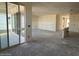 Spacious living area with sliding glass doors for a bright and airy feel at 4509 S 95Th Dr, Tolleson, AZ 85353