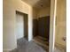 Bathroom showcasing a partially tiled shower and unfinished space, ready for customized design and completion at 4517 S 95Th Dr, Tolleson, AZ 85353