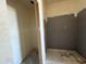 Bathroom with unfinished shower and fixtures, presenting an opportunity for custom design and personalization at 4517 S 95Th Dr, Tolleson, AZ 85353