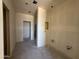 Bathroom with separate spaces, showcasing an open layout and awaiting final fixtures for modern comfort at 4517 S 95Th Dr, Tolleson, AZ 85353