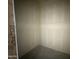 Walk-in closet space awaiting shelving and storage solutions, providing ample room for organization at 4517 S 95Th Dr, Tolleson, AZ 85353