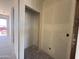 Closet with drywall walls offers an organized storage space, ready for shelves and rods at 4517 S 95Th Dr, Tolleson, AZ 85353