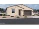 Single-story home with a two-car garage and desert landscaping at 4517 S 95Th Dr, Tolleson, AZ 85353