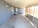 Covered patio with concrete flooring and screened sides at 7419 E Abilene Ave, Mesa, AZ 85208
