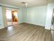 Living area with sliding door to exterior at 7419 E Abilene Ave, Mesa, AZ 85208