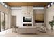 Spacious living room featuring a fireplace, large windows, and comfortable seating at 8226 E Davenport Dr, Scottsdale, AZ 85260