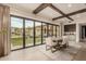 Breakfast nook with table and chairs, overlooking the backyard at 8881 E Via Del Sol Dr, Scottsdale, AZ 85255