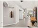 Inviting entryway featuring tile flooring, high ceilings and light neutral paint colors at 9523 E Sandy Vista Dr, Scottsdale, AZ 85262