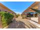 Private courtyard with desert landscaping between the home's wings at 9523 E Sandy Vista Dr, Scottsdale, AZ 85262