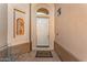 Close up of front door with desert landscaping and barrel cacti at 9523 E Sandy Vista Dr, Scottsdale, AZ 85262