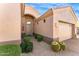 Beautiful front exterior featuring desert landscaping and a two car garage at 9523 E Sandy Vista Dr, Scottsdale, AZ 85262
